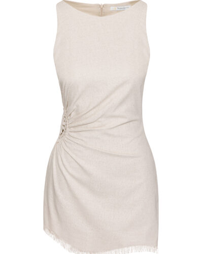 This dress is a sleeveless, natural beige mini-dress made from a lightweight fabric. It features a gathered, ruched detail at the side with an open crochet accent, adding a unique and stylish texture. The bottom hem has a delicate fringe trim, giving the dress a relaxed, bohemian vibe. The simple round neckline and fitted silhouette highlight its minimalistic yet elegant design, perfect for casual or semi-formal summer wear.