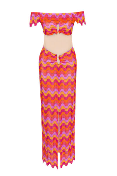 Colorful retro two-piece outfit with wavy pink, orange, and yellow pattern, featuring an off-shoulder crop top and matching skirt with cutout details