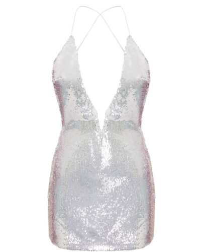 A silver, sequined mini dress with a plunging V-neckline and thin, criss-cross spaghetti straps. The dress has a fitted silhouette and an iridescent shimmer that reflects light, creating a sparkling effect across the fabric.