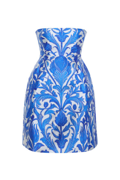 A bold strapless mini dress in structured twill satin, featuring a blue-and-white İznik tile print and a voluminous bubble skirt for a sculpted silhouette.