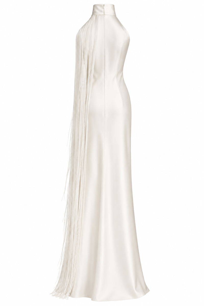 Back view of the Nana Gotti Ay Viscose Satin Fringe Maxi Dress in ivory, featuring a high halter neckline, fitted satin silhouette, concealed back zipper, and dramatic cascading fringe extending to the floor-length hem.