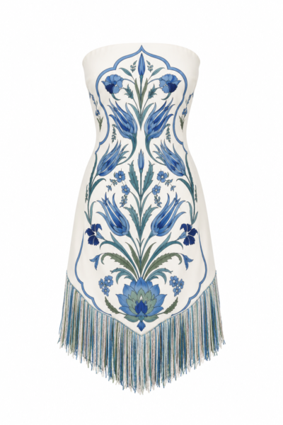 Lale Strapless Fringe Mini Dress by Nana Gotti in ivory with blue İznik-inspired floral print and multicolored fringe hem, front view.