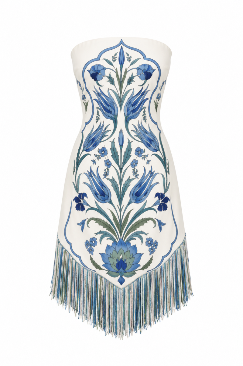 Lale Strapless Fringe Mini Dress by Nana Gotti in ivory with blue İznik-inspired floral print and multicolored fringe hem, front view.