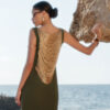 Close-up of Lara Crepe Chain-Drape Maxi Dress showcasing luxurious layered gold chains draped across the open-back design.