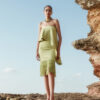 Riva Olive Green Crepe-Back Satin Fringe Midi Dress by Nana Gotti featuring a strapless neckline, asymmetric draped overlay, and long fringe hem, front view.