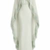 Nerina Mint Green Fringe Cape Maxi Dress by Nana Gotti, featuring a high neckline, fitted crepe silhouette, flowing chiffon cape, and cascading fringe detailing, front view.