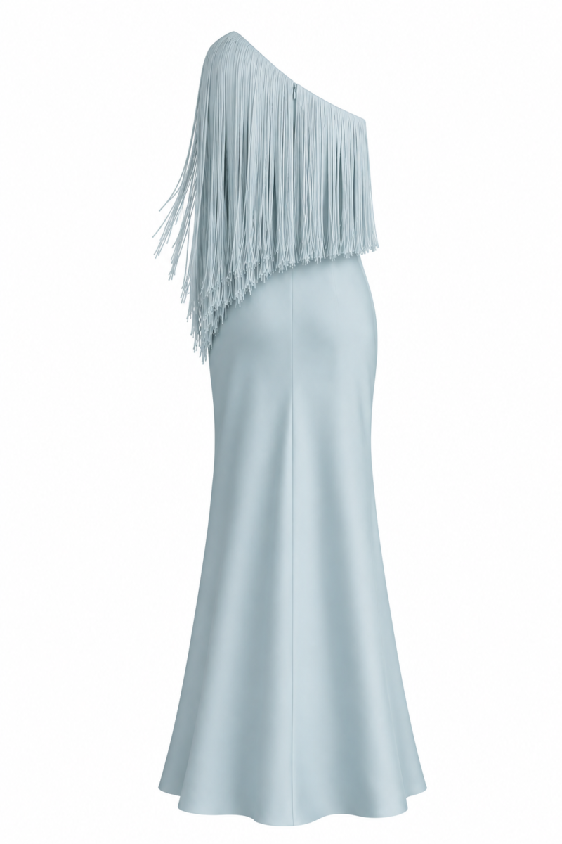 Back view of Nana Gotti Selin Crepe-Back Satin One-Shoulder Fringe Maxi Dress in powder blue, featuring cascading asymmetric fringe, a concealed back zipper, and a fitted mermaid silhouette with a flared floor-length hem.